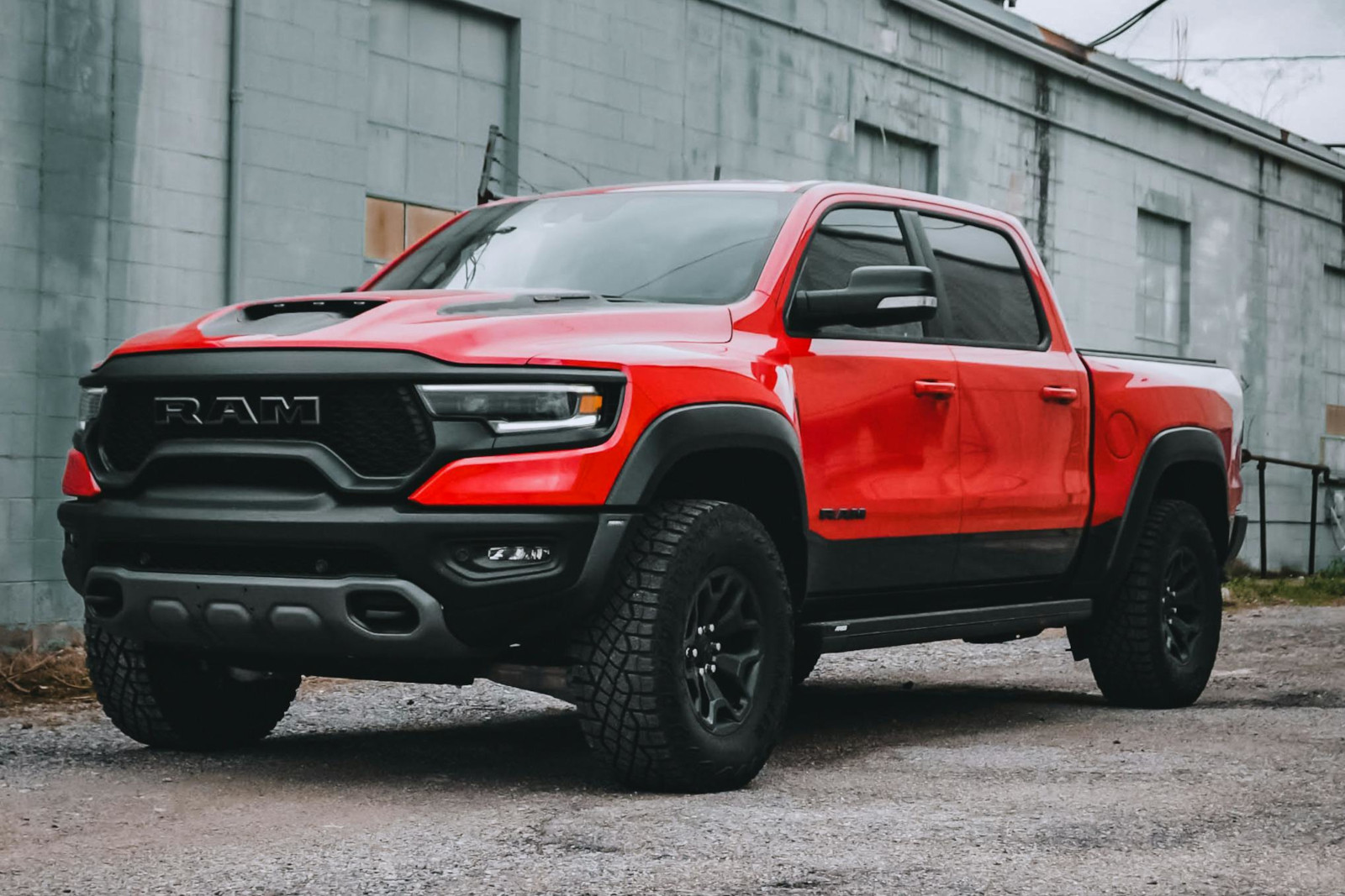 Several cars in a dealership lot representing online vehicle history and window sticker tools